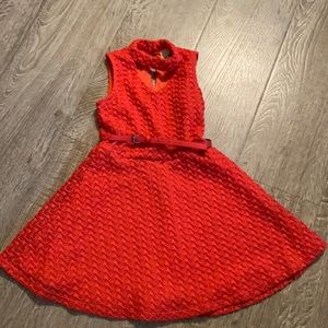 Coral party dress with belt.